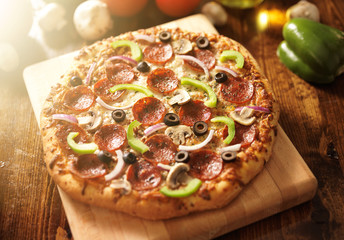 supreme italian pizza with pepperoni and toppings