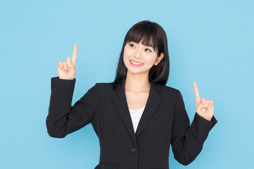 asian businesswoman on blue background