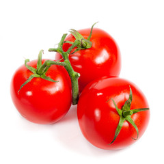 Fresh tomatoes isolated on white