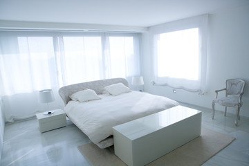 Modern white house bedroom with marble floor