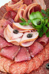 plate of salami, meat delicatessen