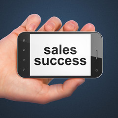 Marketing concept: Sales Success on smartphone