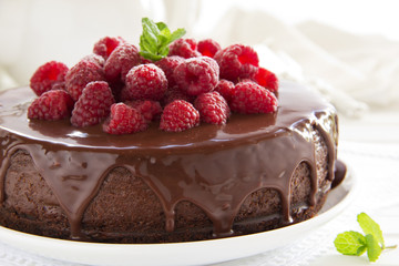 Chocolate cheesecake with raspberries.