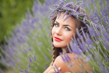 Portrait of young woman in lavender wreath. Fashion, Beauty