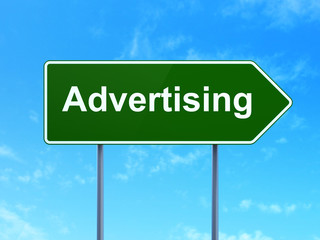 Advertising concept: Advertising on road sign background