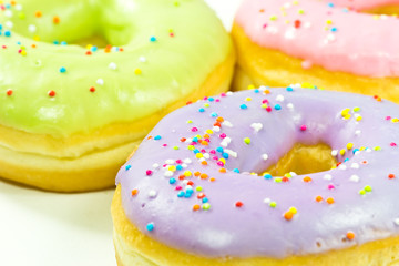 Close up of a selection of colorful donuts.