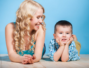 young mother and small son having fun. Family, adorable kid