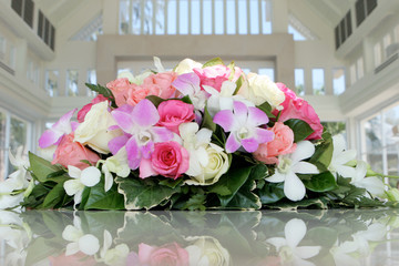 Wedding flowers in a chapel.