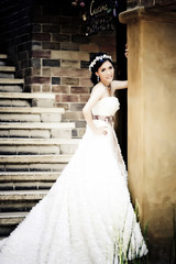 Asian woman in wedding suit show love concept