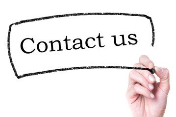 Business hand writing Contact us on glass