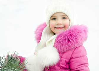 Outdoor portrait of beautiful little girl