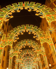 Obraz premium Beautiful night lights in Fallas fest of Valencia in calle Sueca