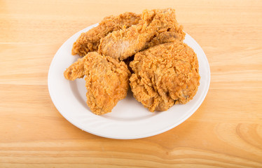 Plate of Fried Chicken on Wood Table