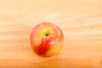 Single Apple on a Wood Table