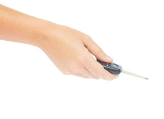 hand holding remote car key