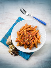 pasta with tomatoes dried grape and pine nuts