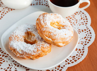 Two cream puffs