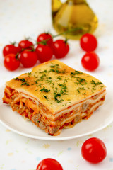 Italian lasagna with meat and tomatoes. Macro.