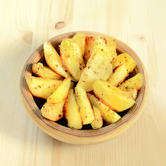 Fried potato wedges