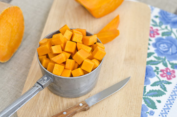 Preparing raw pumpkin for cooking