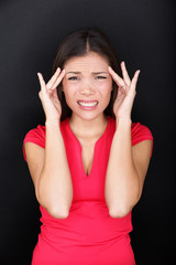 Fototapeta na wymiar Stressed woman with headache stress migraine