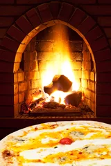 Fotobehang pizza quatro formaggi and open fire in stove © vvoe
