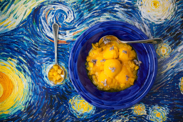 Mango sorbet with hot mango and violet liqueur - obrazy, fototapety, plakaty