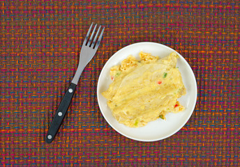 Small serving of chicken enchiladas with fork