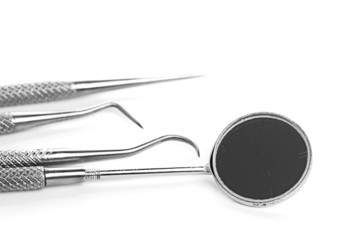 Basic dentist tools isolated on white