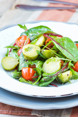 Healthy salad with brussels sprouts cabbage , tomatoes, salad