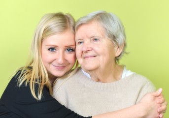 Senior woman with her granddaughter. Happy and smiling.