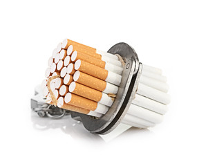 Addition concept with cigarettes and handcuffs