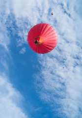 Fototapeta premium Red balloon in the blue sky
