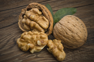 Walnuts group close up on the wooden table