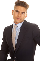 man in suit up close serious expression