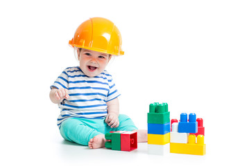 baby playing with building blocks toys