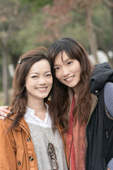 Happy smiling Asian women in the park