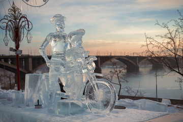 Don Quixote and it squire on a bicycle, a sculpture from ice