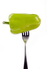 green pepper in fork