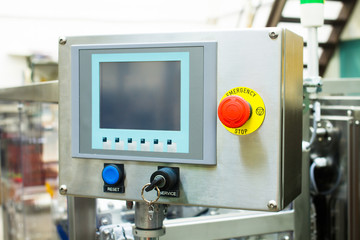 red button at control panel