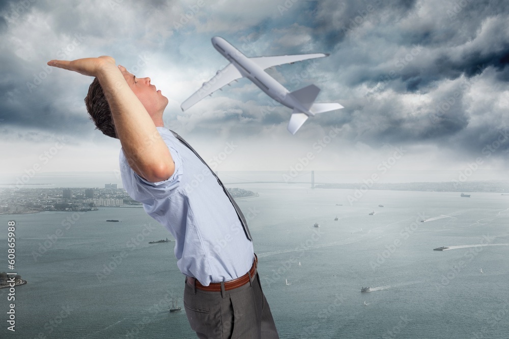 Aufkleber composite image of businessman standing with hands up
