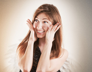 Fototapeta premium Portrait of happy girl as angel