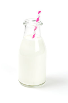 bottle of milk with striped straw