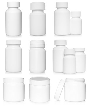 White medical containers set on white background .