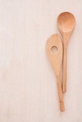 wooden spoon on textured background