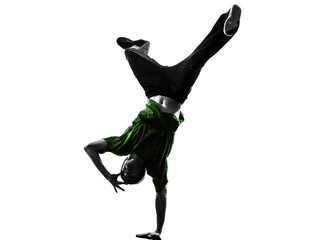 young acrobatic break dancer breakdancing man silhouette © snaptitude