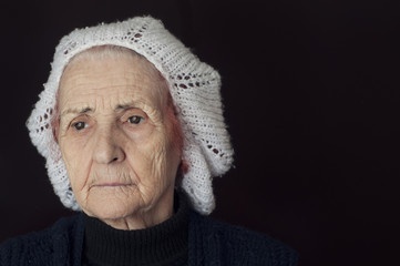 Portrait of a sad old woman