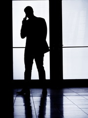 silhouette man phoning
