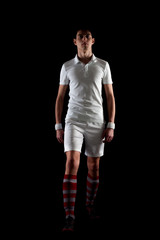 Football player man on black background Full Length