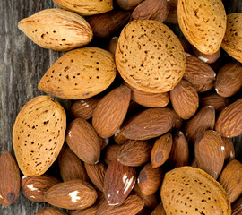 almonds on wooden surface